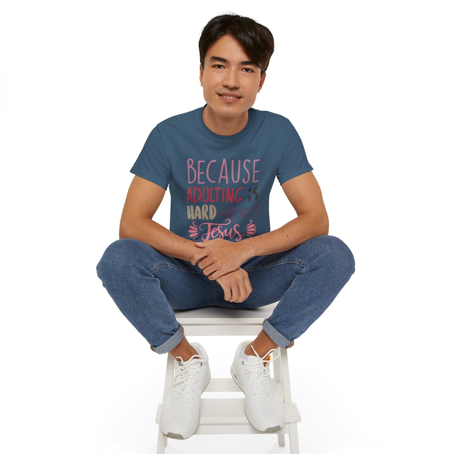 man in teal blue shirt with words "Because Adulting is Hard without Jesus"