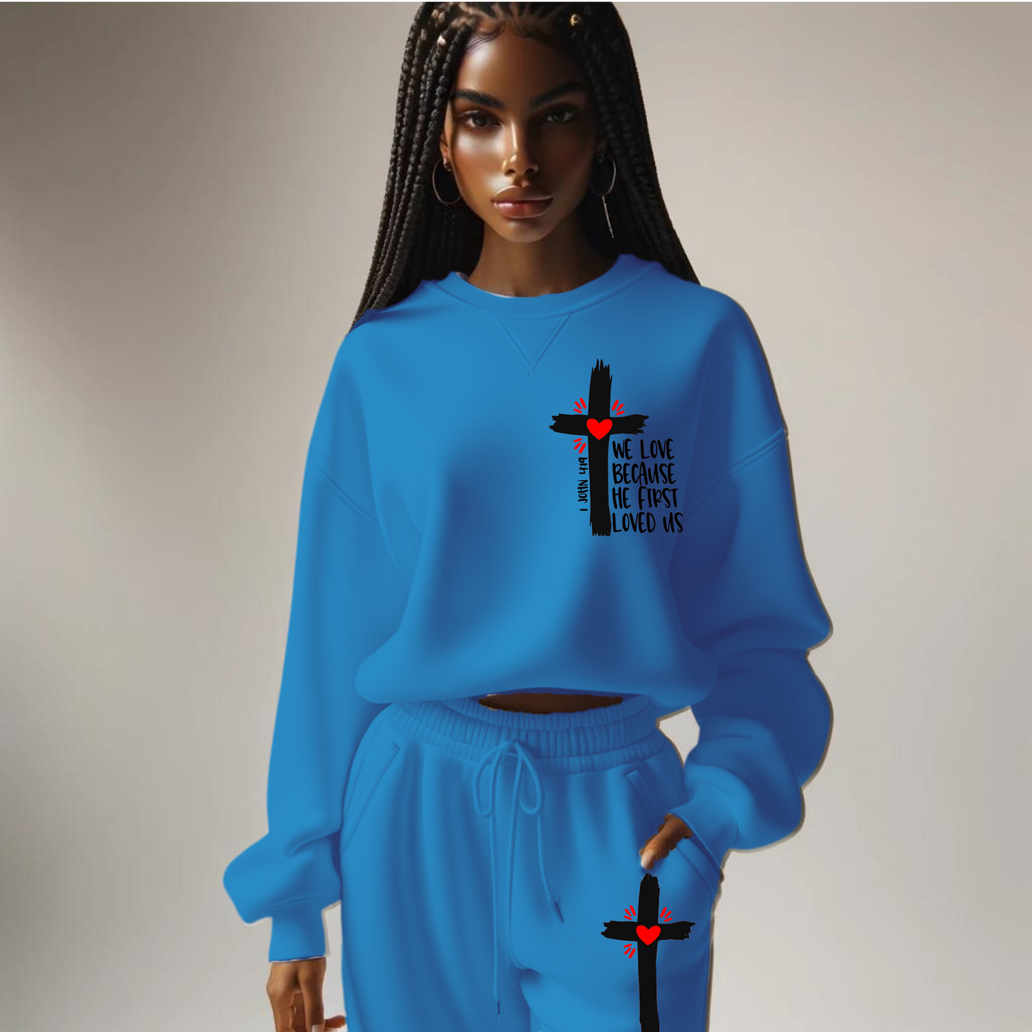 African American Woman with Blue sweat suit and jogging pants. Black Cross with the words We Love because he first Loved