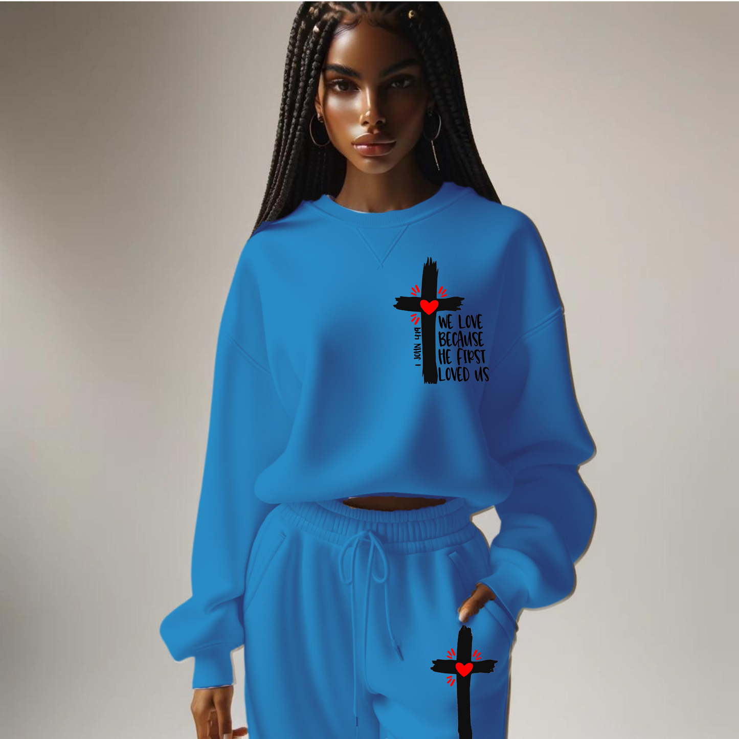 African American Woman with Blue sweat suit and jogging pants. Black Cross with the words We Love because he first Loved 